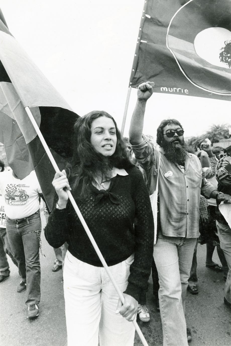 Marcia Langton (foreground) and Bob Weatherall (right) marching with protesters