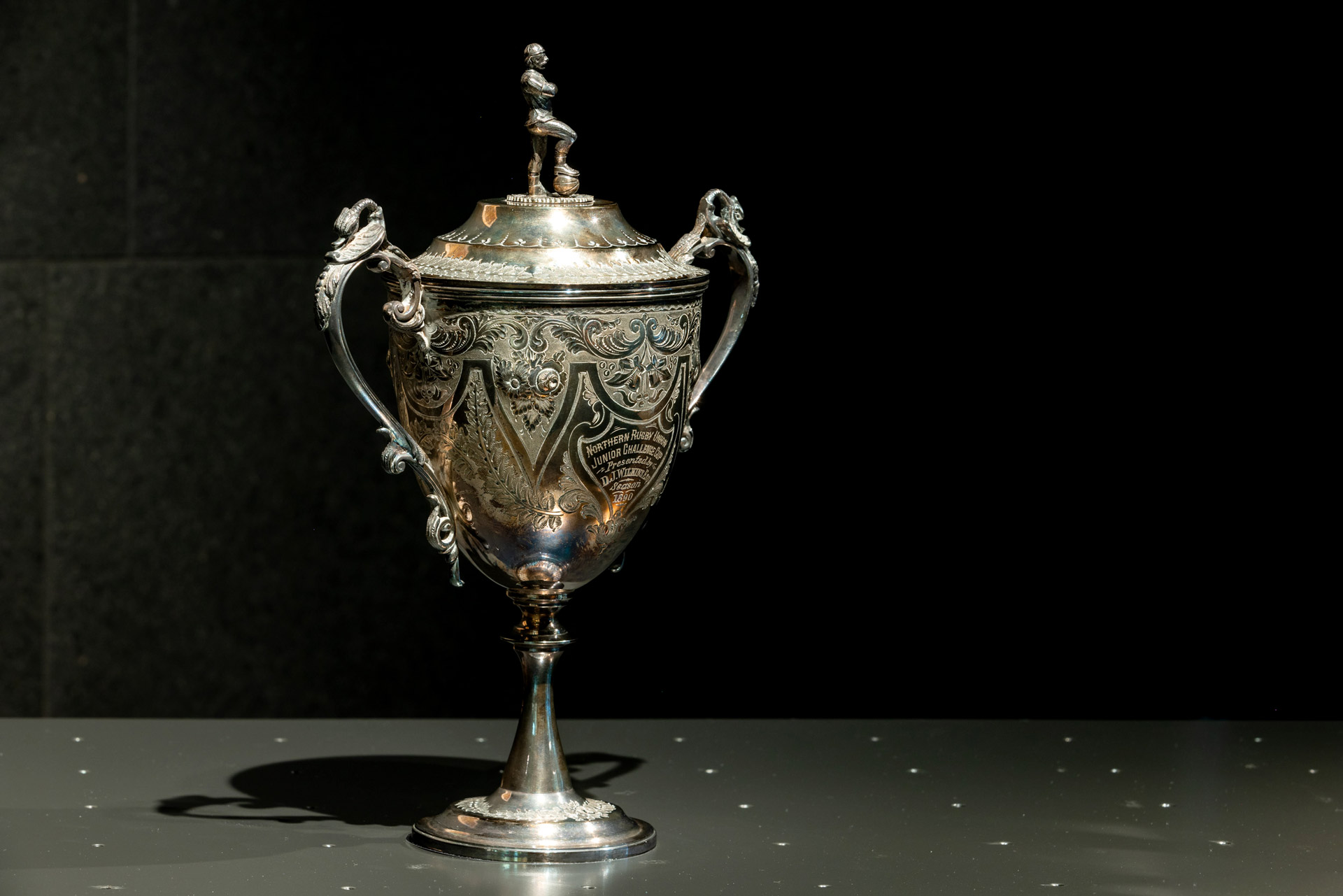 A silver plated cup.