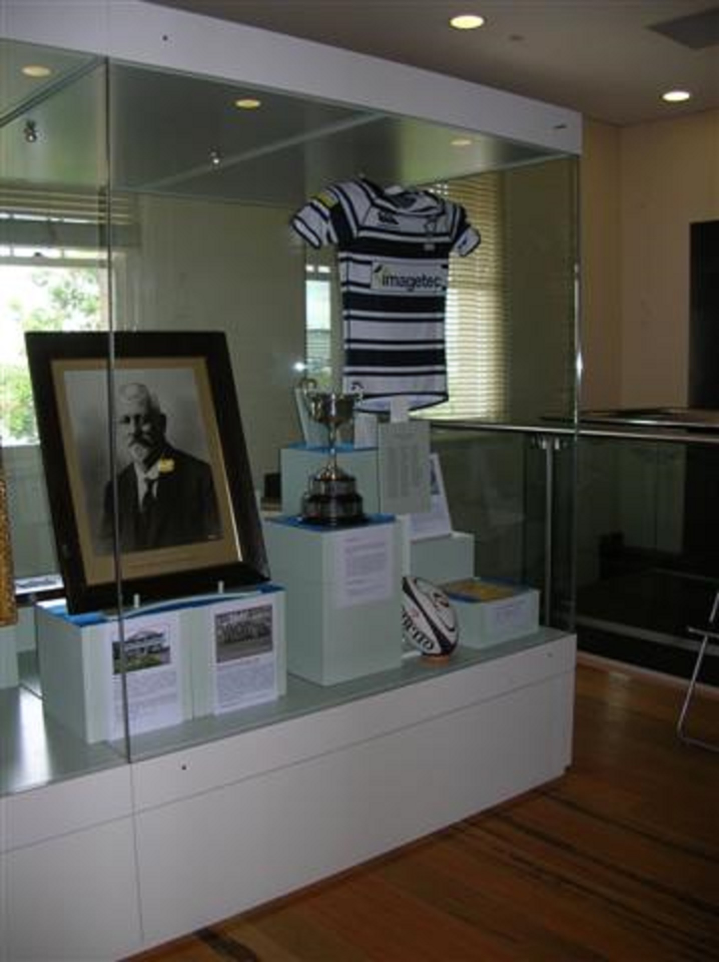 a display case featuring Thomas Welsby Jersey 