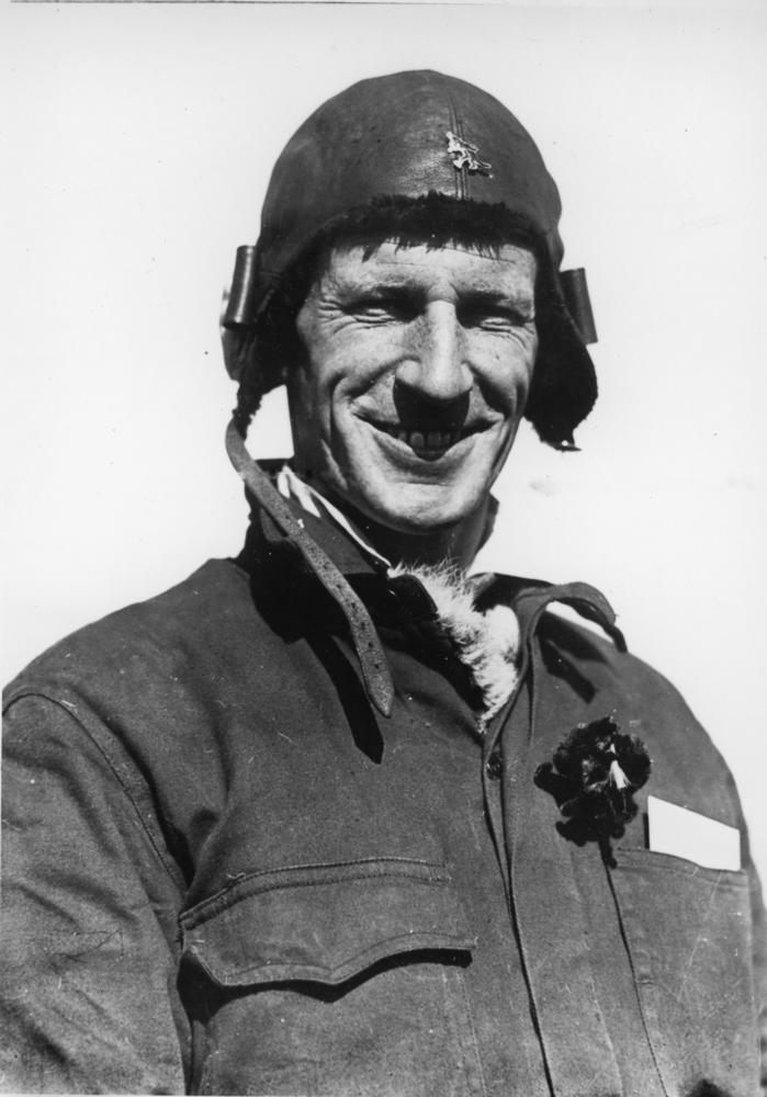 Sir Charles Kingsford Smith in flying gear, Eagle Farm, Brisbane, 1928