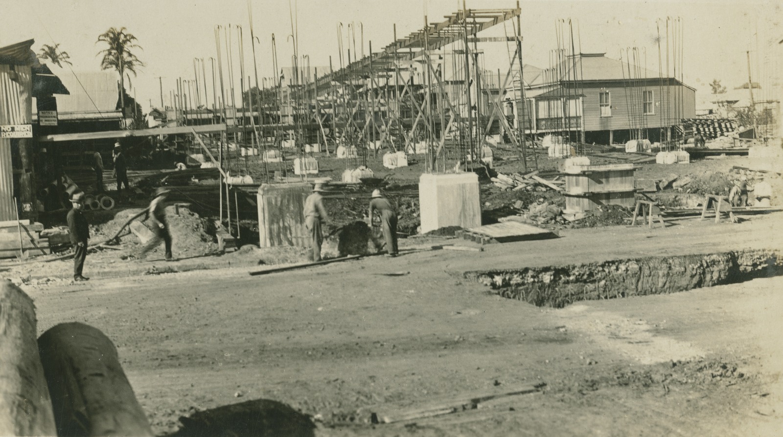 A construction site for the Montague Road end of the William Jolly Bridge. You can see houses in the background of the construction.