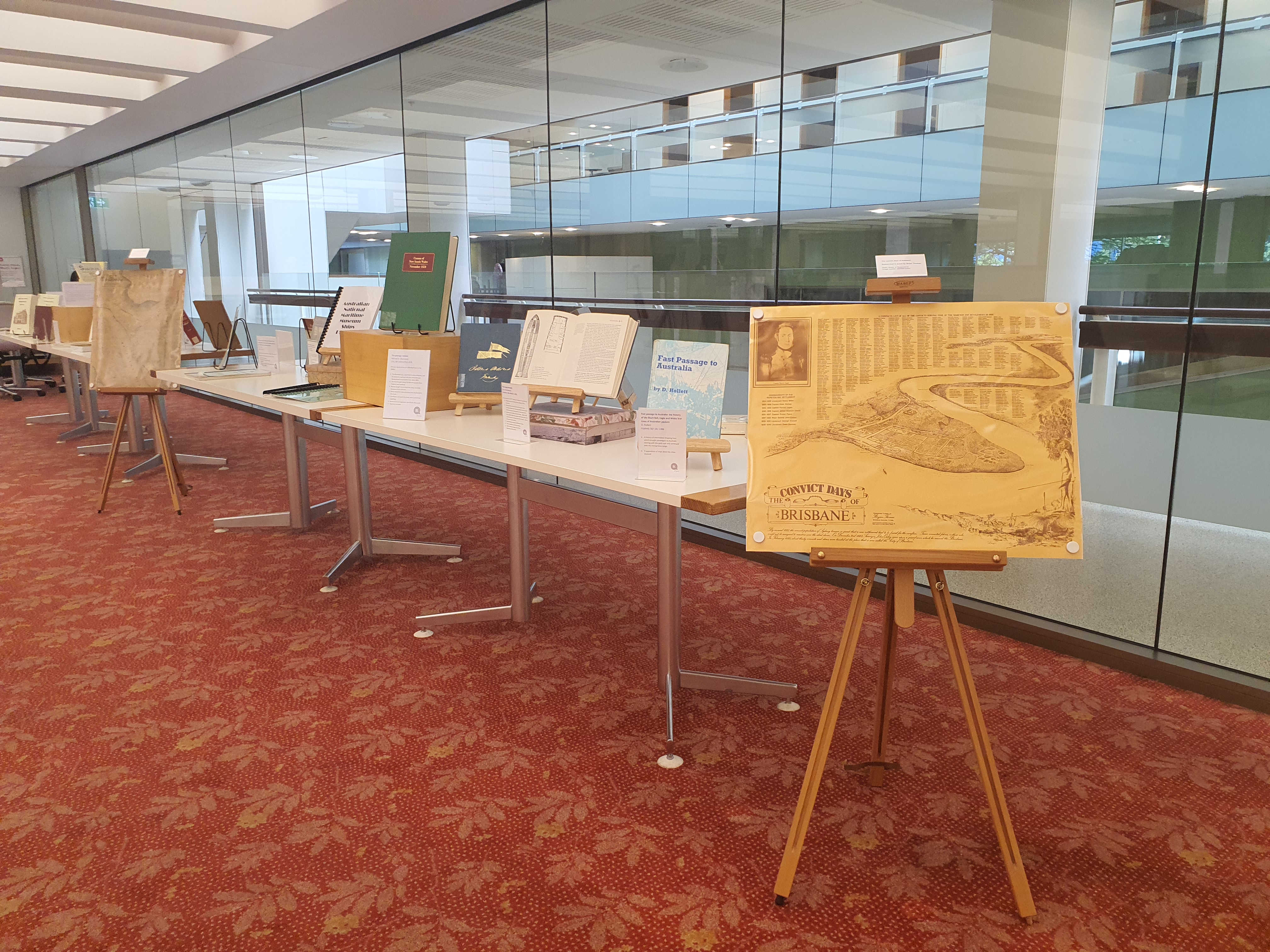 Books and maps on display in State Library of Queensland, level 3
