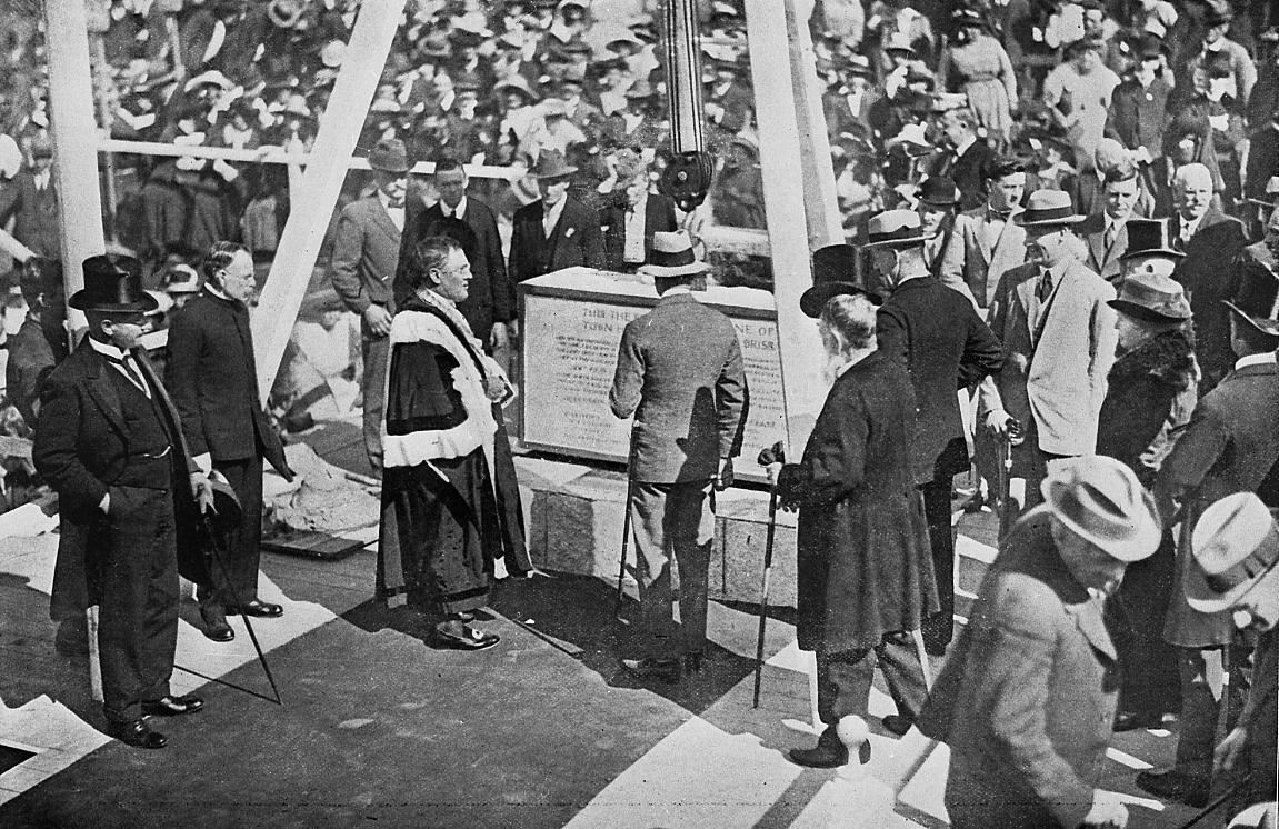 Crowd of people observe the official laying of the Foundation stone for Brisbane's City Hall, 1920