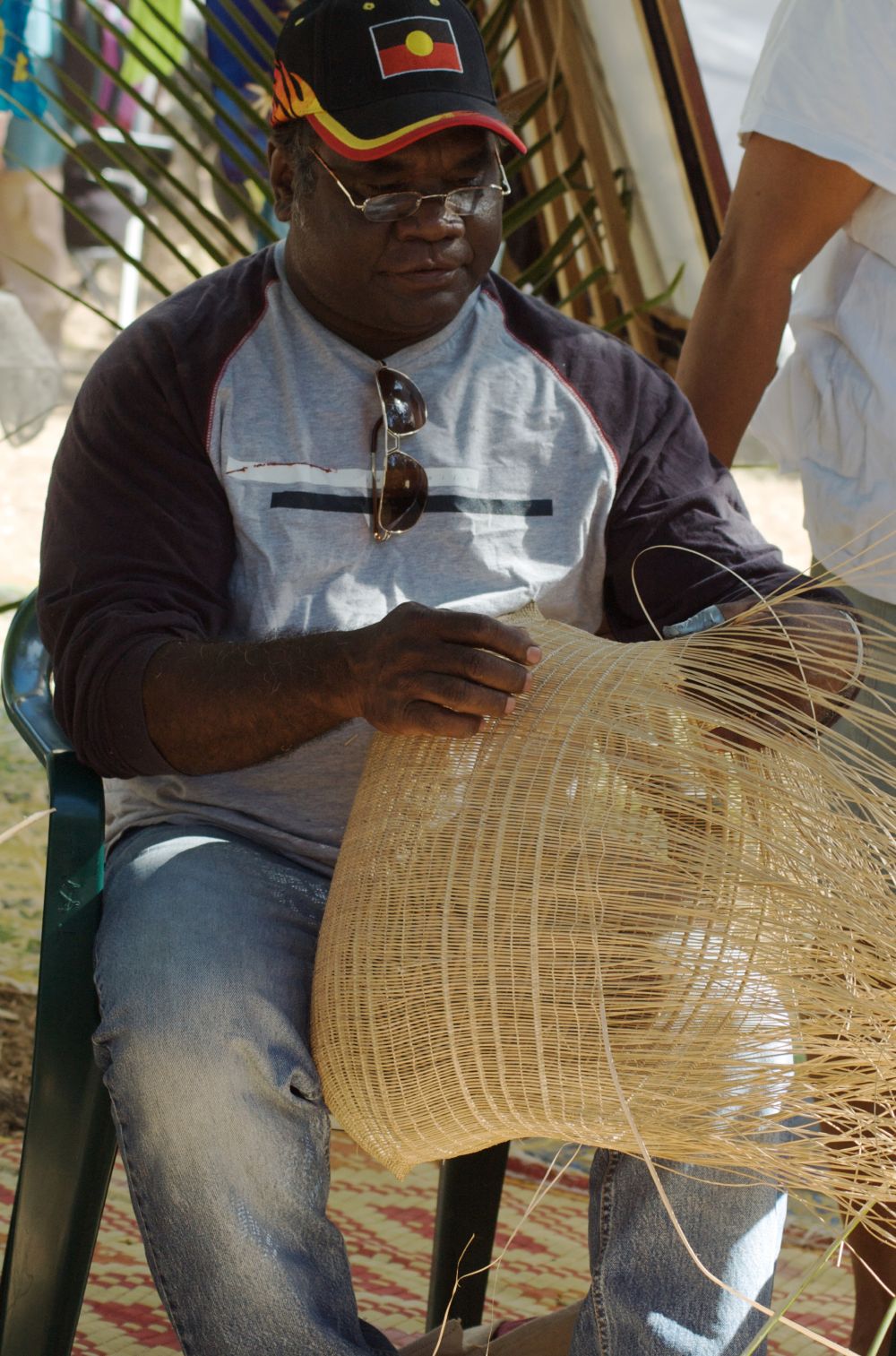 Abe Muriata weaving at the Laura Aboriginal Dance Festival, 2009 (0001-0171).
