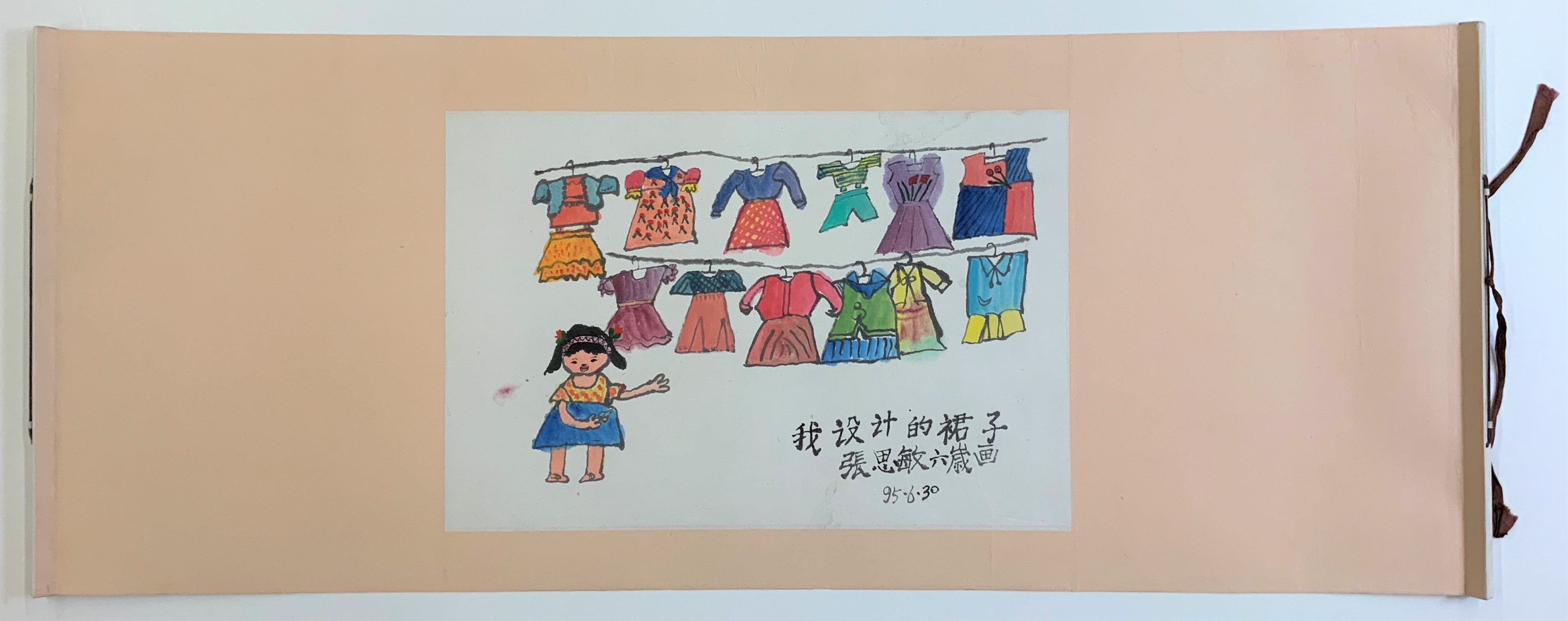 After conservation. Translation of inscription: “Dresses I Designed” By Simin Zhang, 6 years old, 30 June 1995. 