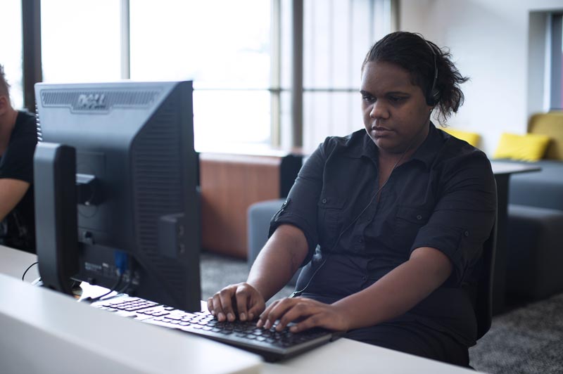 Client using a public computer. | State Library of Queensland