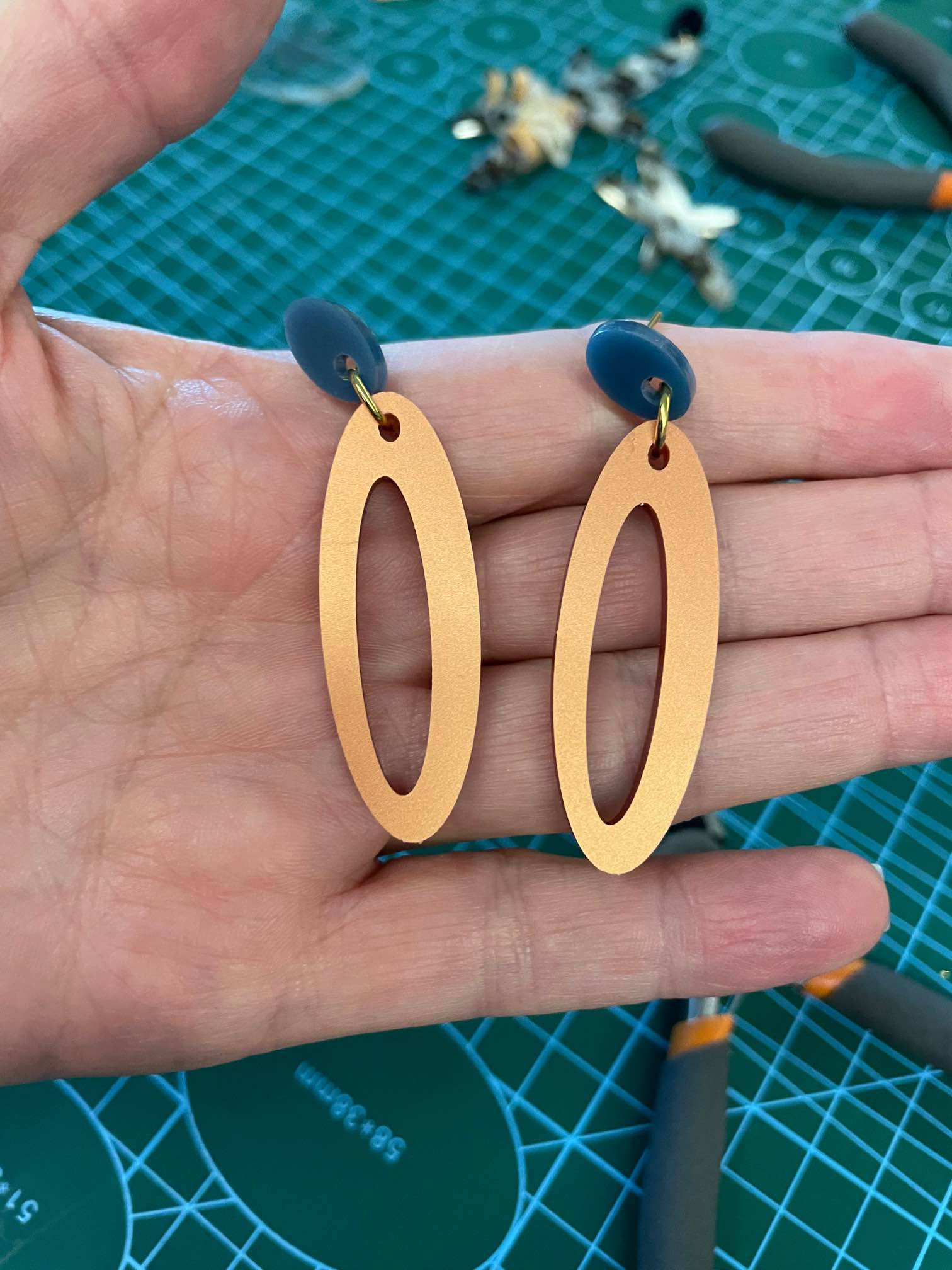 Oval laser cut earrings