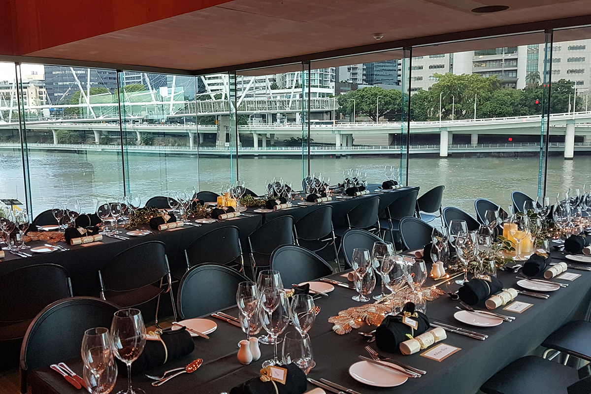 The Red Box set for a banquet overlooking the Brisbane River