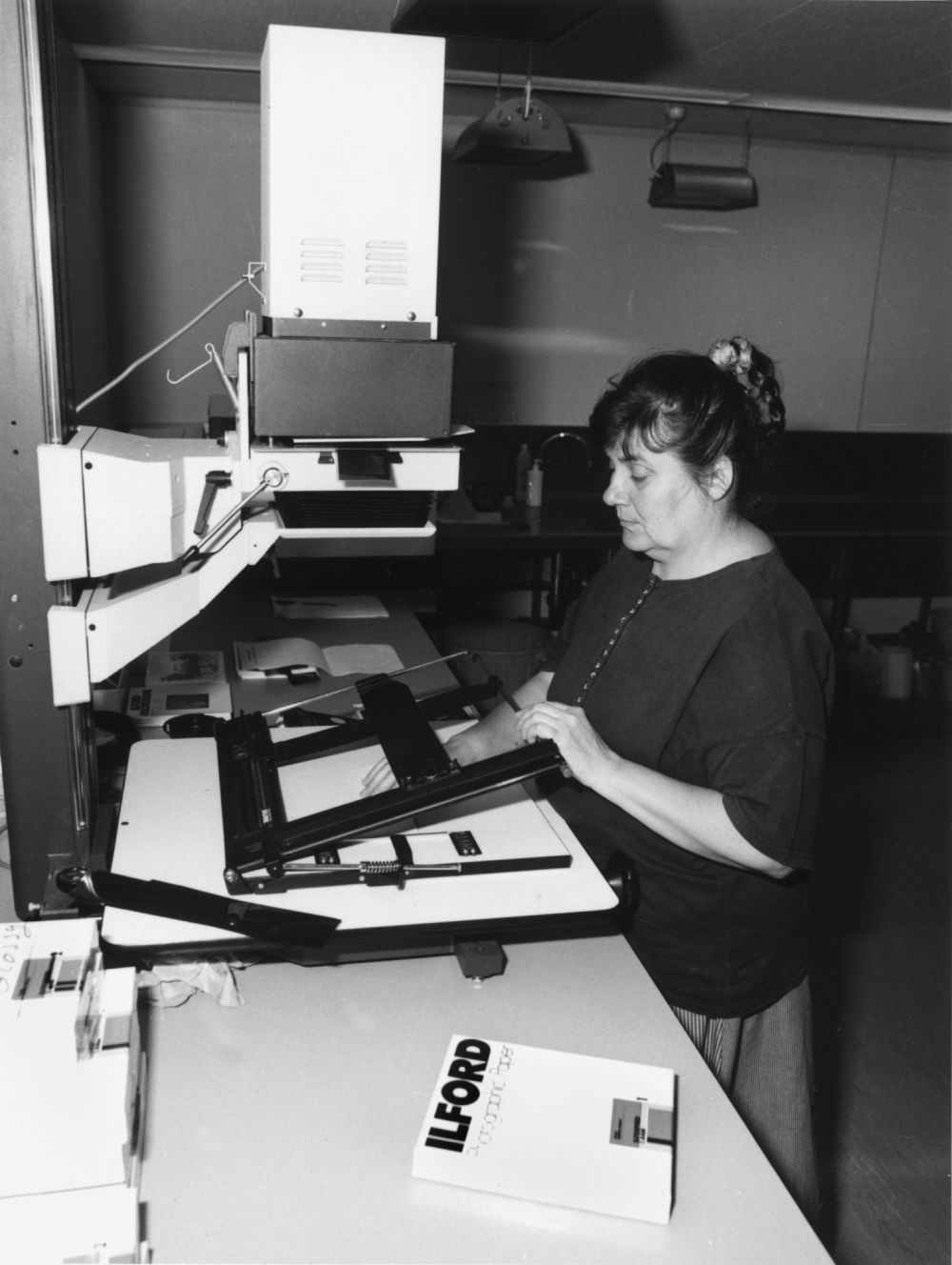 Woman working in photography studio at State Library of Queensland.