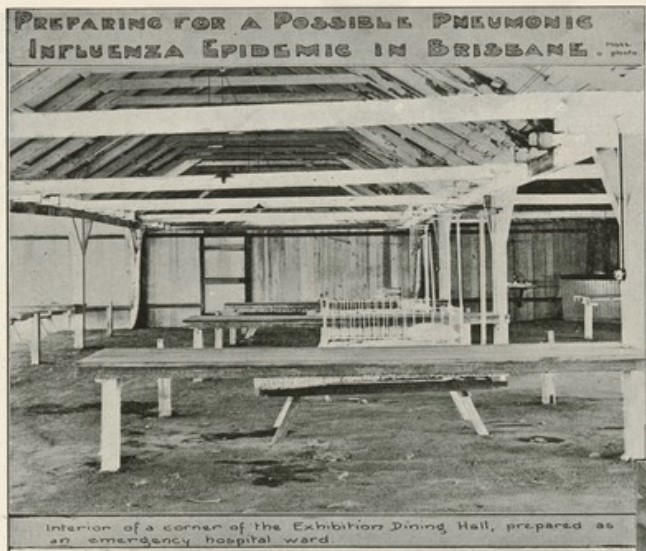 Photo of interior of the Exhibition dining hall, prepared as an emergency hospital ward.