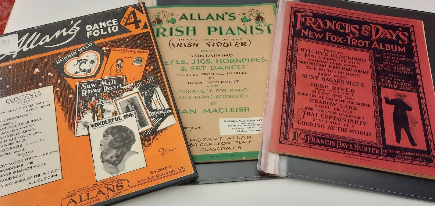 Three covers of sheet music albums