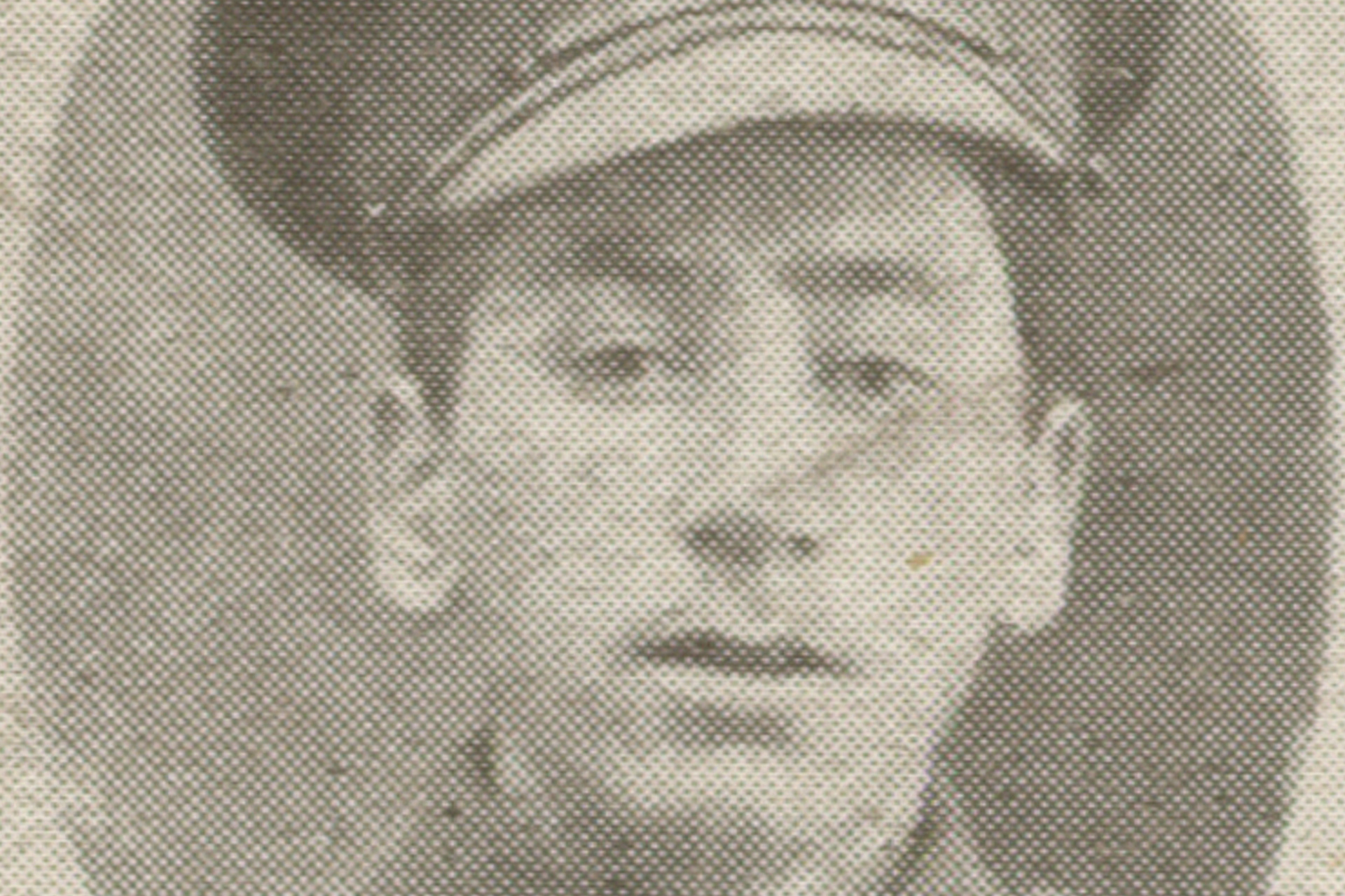 A black and white photograph of a young soldier.