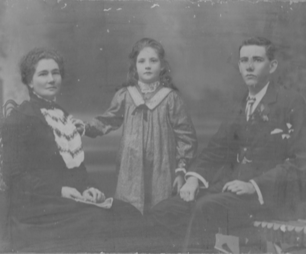 Family portrait of Mary Ann Winifred Low (nee Oram) with her children Winifred Fanny Low and George Low