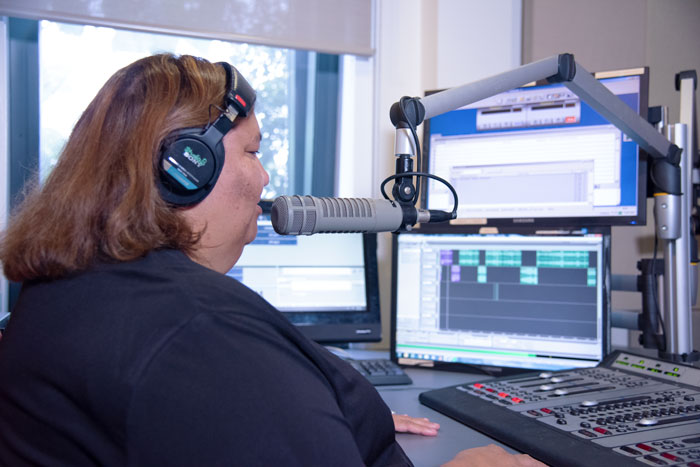 Radio presenter at 98.9FM