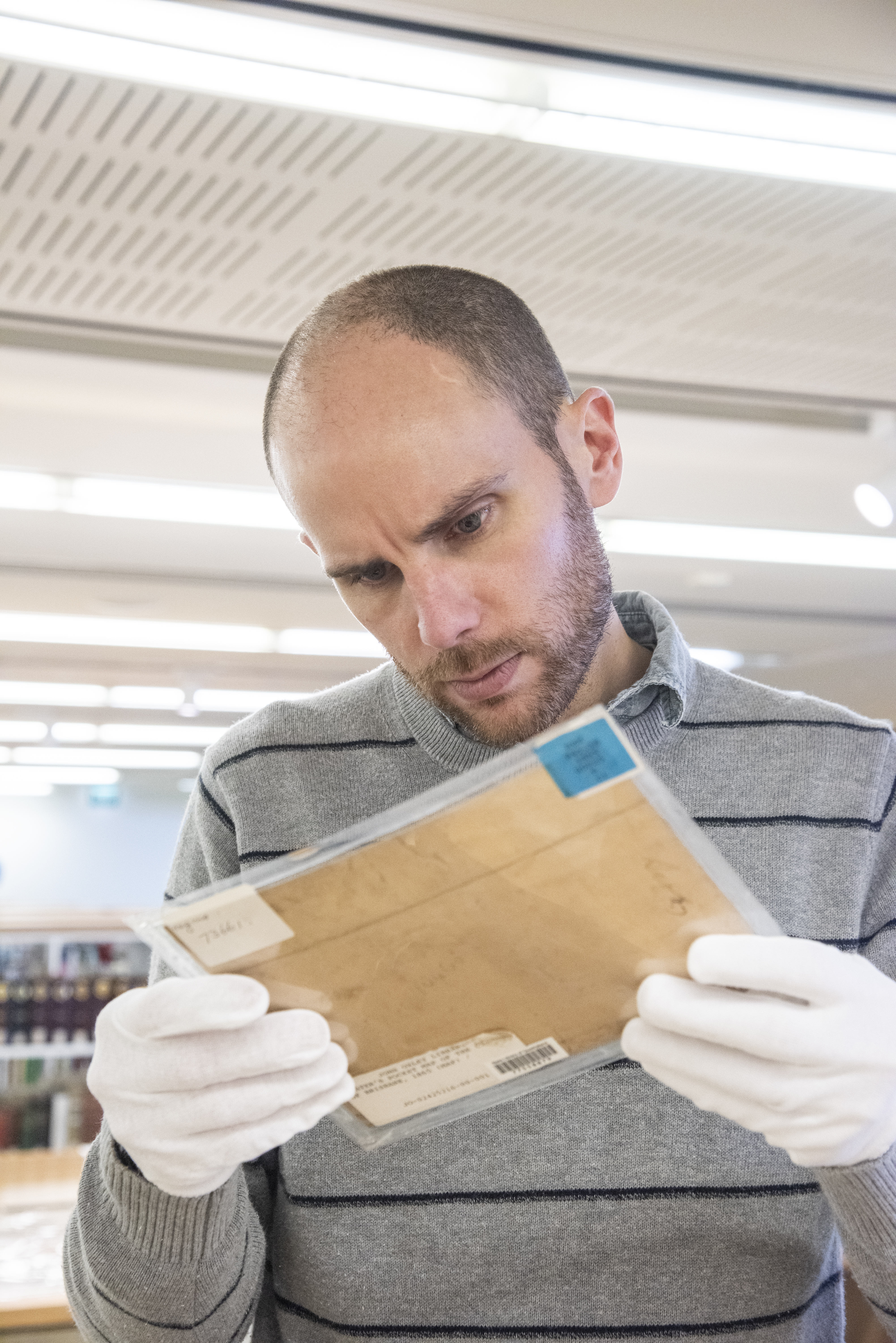 Dr Keir Winesmith, Digital Collections Catalyst 2020, examines a rare map