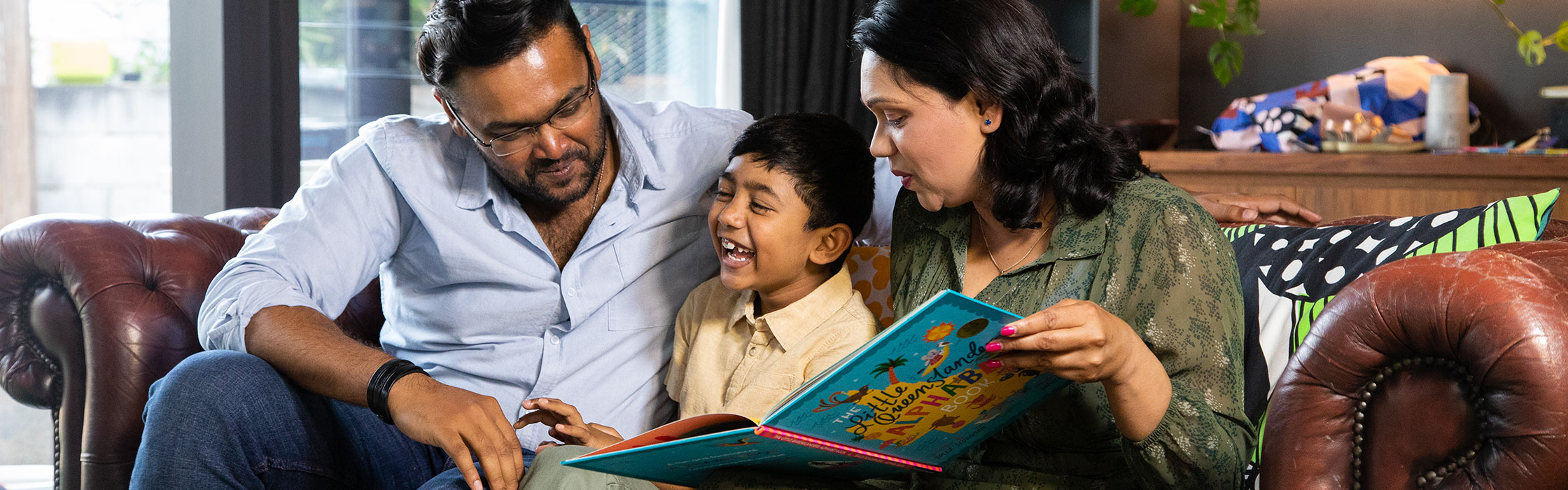 Family reading to child