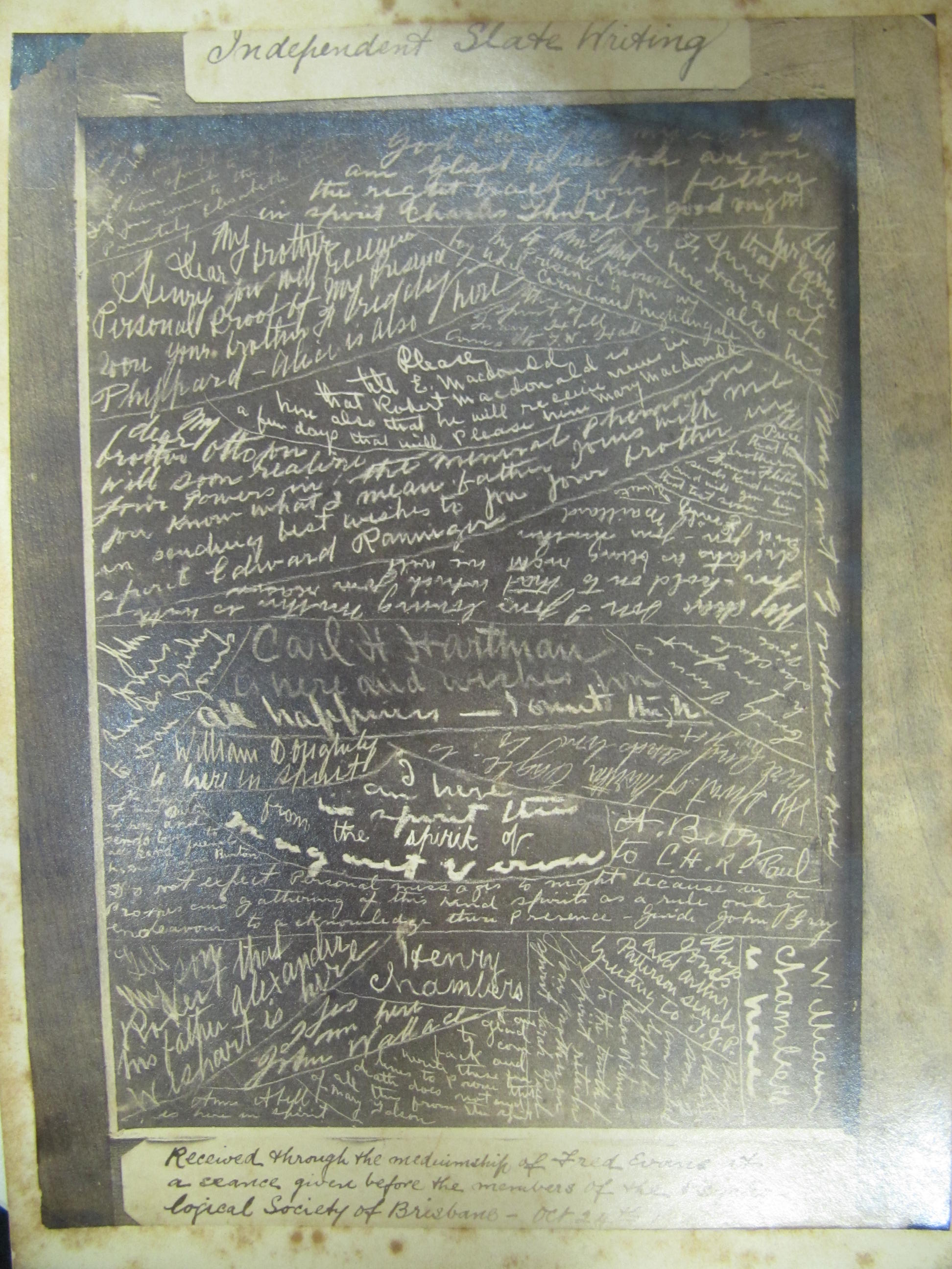 Photograph of spirit slate-writing which occurred during a séance in Brisbane on 24 October 1888. 