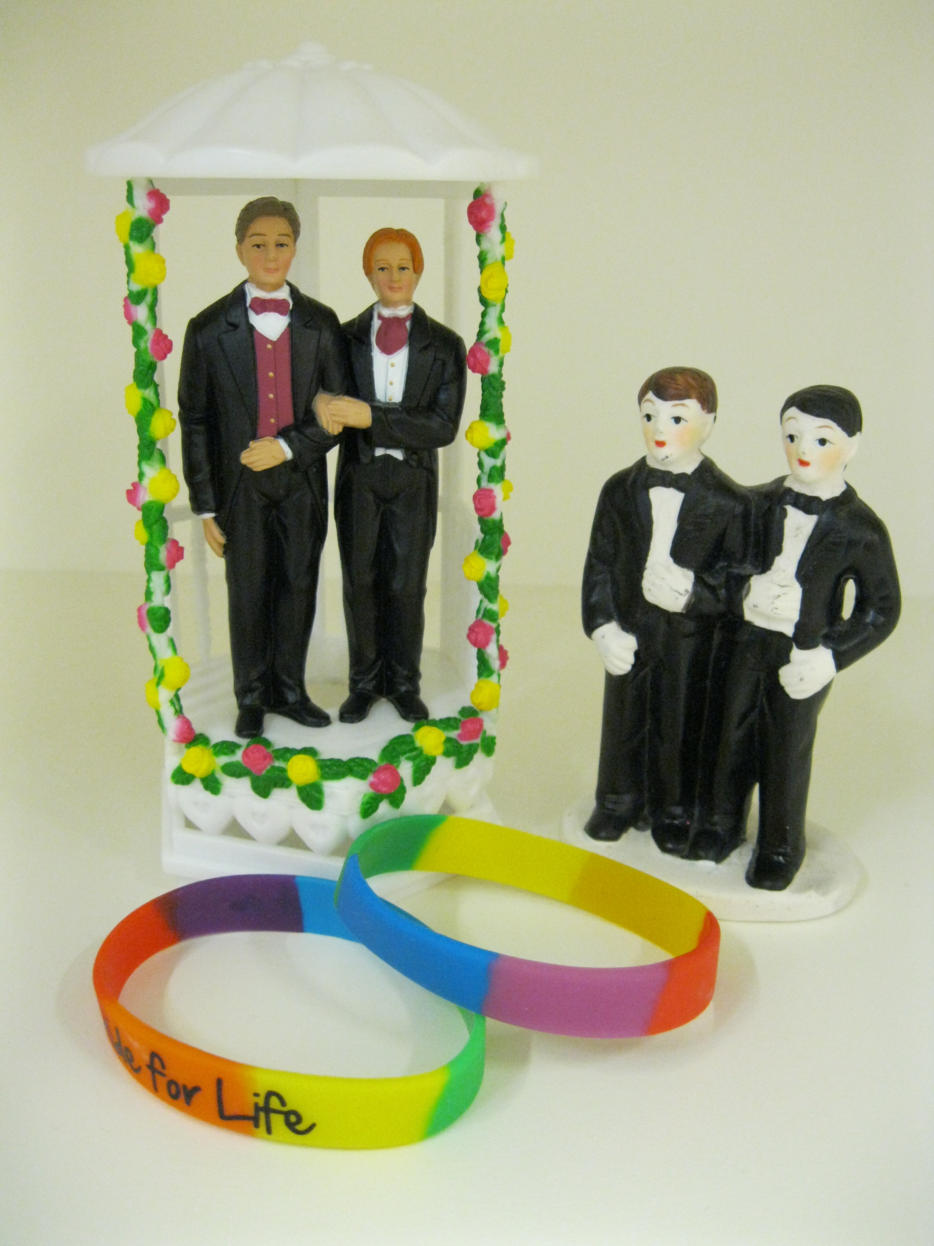 Groom and groom cake toppers from the Equal Love collection
