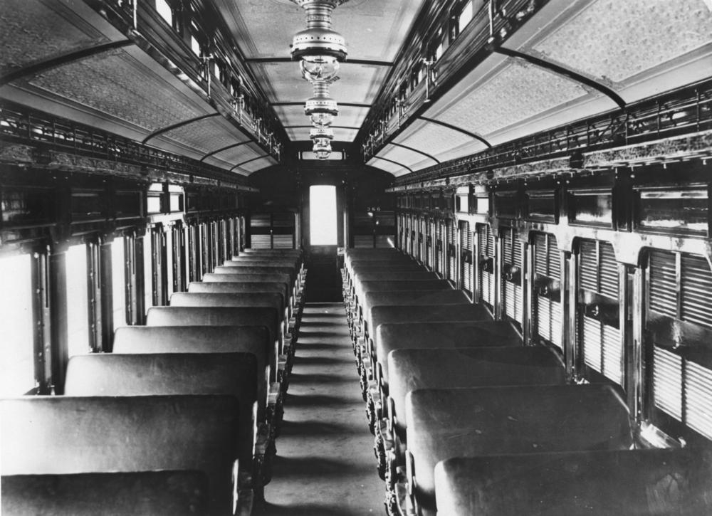 Interior view of first class suburban railway carriage ca. 1905. 