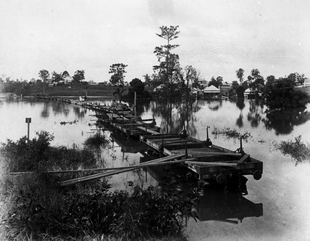 Makeshift bridge of railway wagons during the 1890 flood in Auchenflower, Brisbane. 