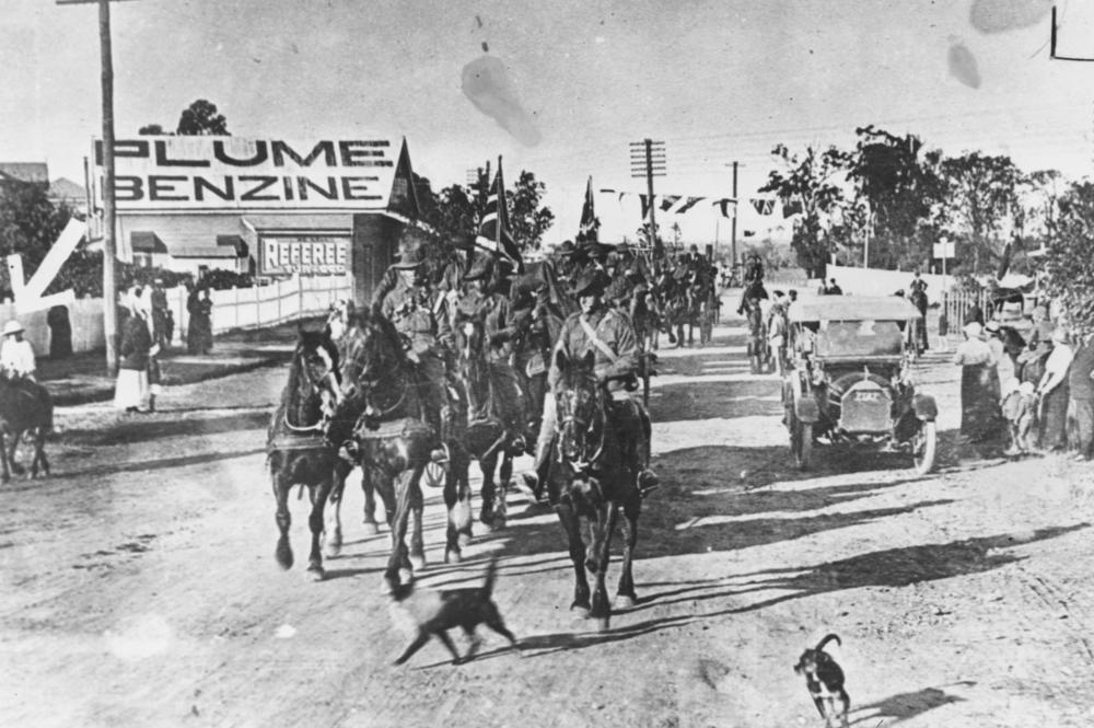 Dungarees passing along Ipswich Road, Moorooka 1915. John Oxley Library, State Library of Queensland. Neg 11395