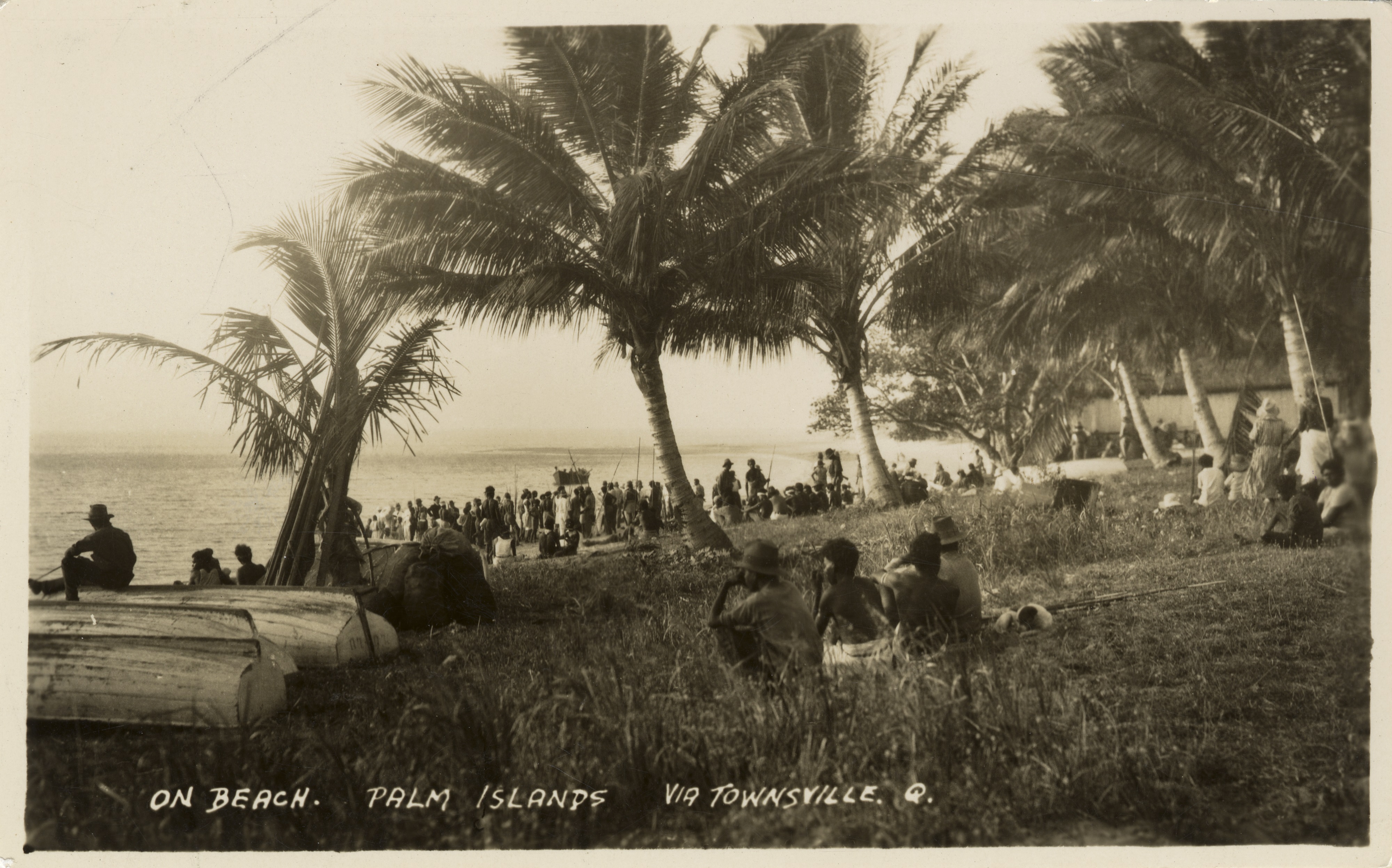 Crowds gathered on the beach at Palm Island, Queensland