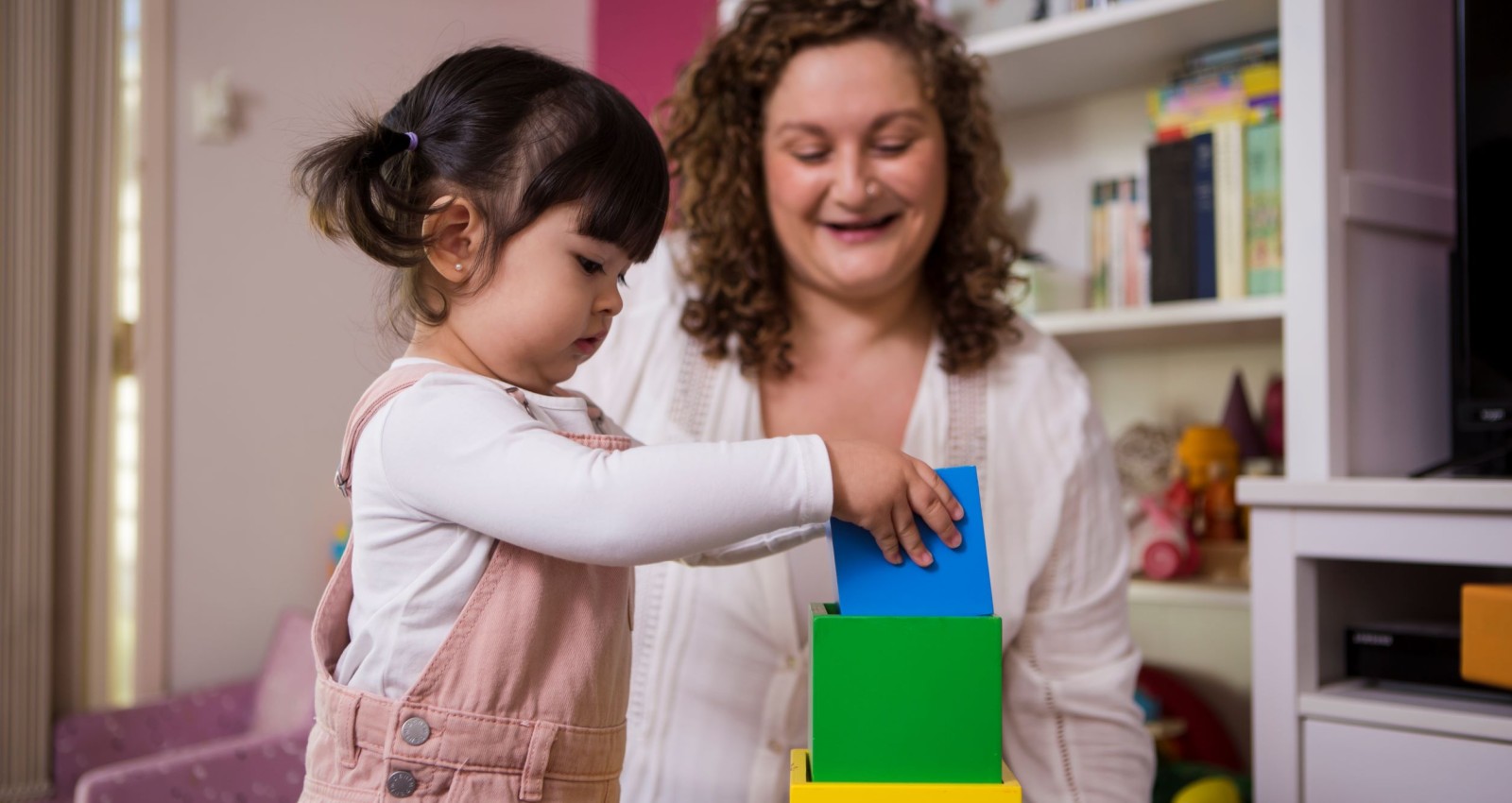 Toddler playing with blocks