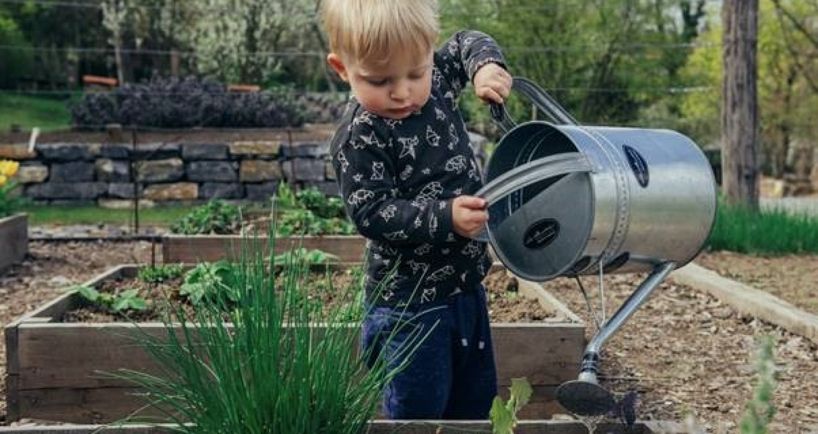 Child with watering can
