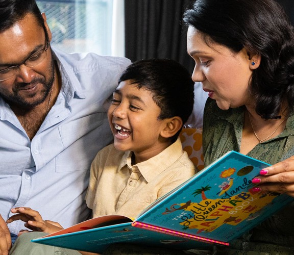 Family reading to child