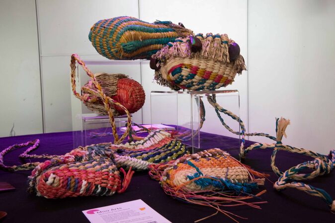 display of 6 woven bags by Torres Strait Island artists