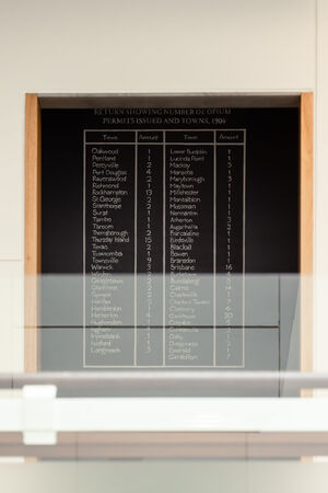 A view of part of the artwork "Black Opium" by Fiona Foley showing a chart that says "Number of opium permits issued and towns" 