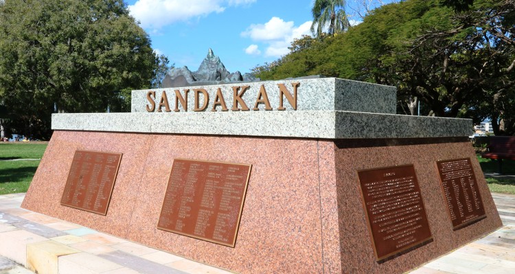 New Farm Sandakan Memorial outdoor stone memorial with plaques and sculpture