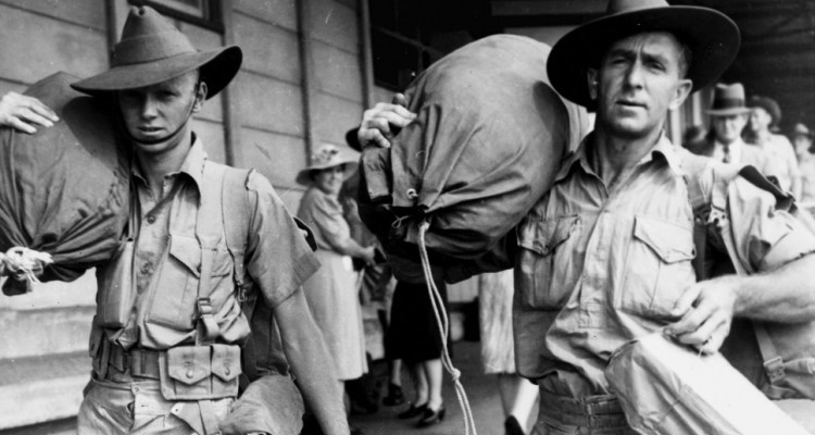 Soldiers carrying their kit bags - railway station in Brisbane