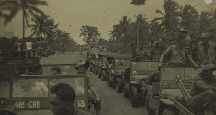 Australian soldiers travel in a convoy during World War II