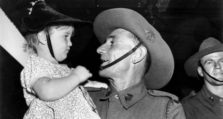 Glenis Anderson welcomes her father Clark home from the war