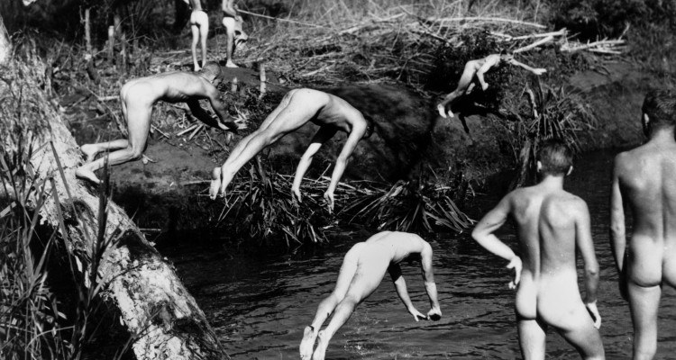 Naked servicemen swimming somewhere in the Darwin area during World War II