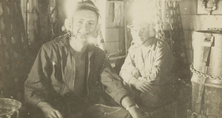 RAAF airman Jon Fallows with another serviceman, inside a military plane, Vietnam, 1968-1969, John Oxley Library, State Library of Queensland