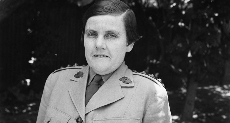 Head and shoulders of woman in defence uniform, 1944