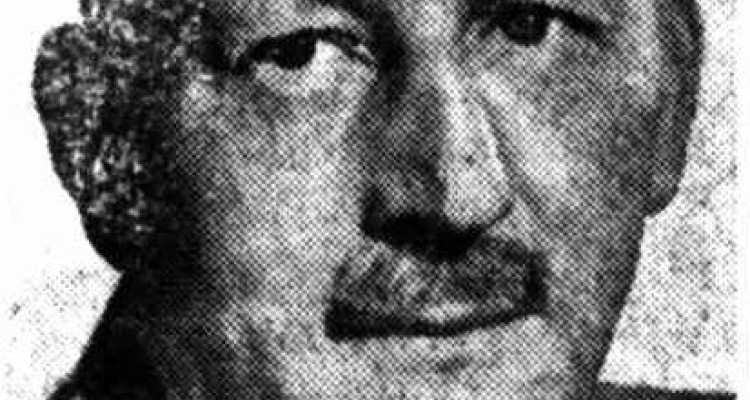 Black and white photograph of George Caiger