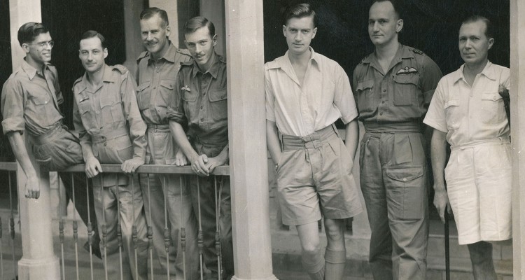 Alan Douglas Groom and other cadets standing on a veranda, 1935