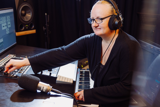 Patron using The Edge Recording Studio.