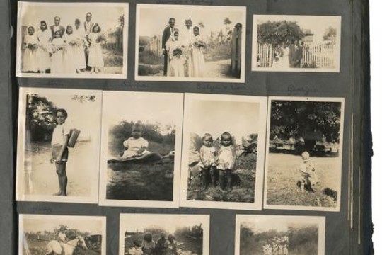 Photographs of Aboriginal children and a wedding in a photograph album