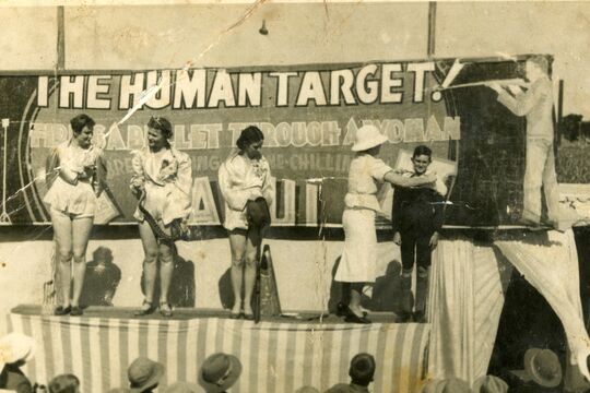 Human Target tent show. Thelma Pink in Safari Suit, Daisy Pink next to the megaphone holding boy’s hat circa 1931.