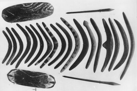 Aboriginal artefacts including boomerangs, nulla nulla and shields