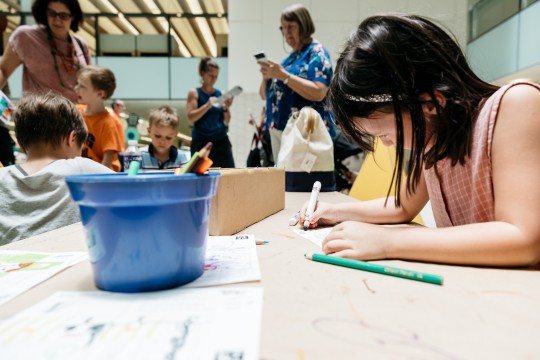 Girl making a book
