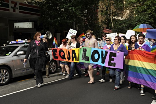  Woman with megaphone during march at Marriage Equality Rally in Brisbane, 2011