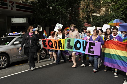 Woman with megaphone during march at Marriage Equality Rally in Brisbane, 2011