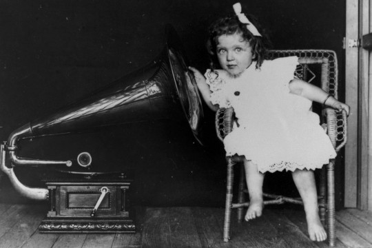 Child listening to a gramophone 1903-1913