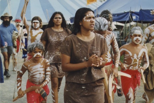 Jagera Jarjum dancers walk onto the stage at the Woodford Folk Festival, Queensland, 1997.