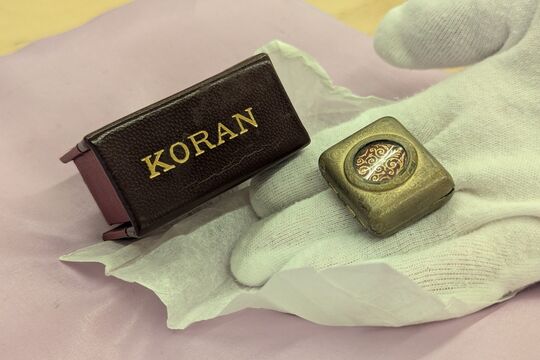 Koran in hand